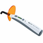 3M ESPE Elipar DeepCure-L LED Curing Light with orange light shield and battery indicator – front angle view