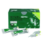 GC Fuji IX GP Extra dental glass ionomer restorative capsules 50 pack Shade A2 – green GC box with yellow Extra badge – 2 silver foil dental capsules and 2 white mixing tips shown in front – radiopaque posterior dental glass ionomer cement by GC Corporation Japan worldwide
