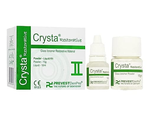 Prevest DenPro Crysta Restorative Glass Ionomer Cement complete kit – CE 0123 marked box with Crysta Restorative Liquid 10ml bottle and Crysta Glass Ionomer Powder 15g jar – radiopaque self-cure fluoride-releasing GIC for restorations in primary and permanent teeth worldwide
