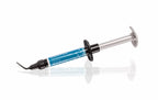 GC everX Flow dental flowable composite Bulk Shade syringe 3.7g 2.0mL angled view – teal blue labeled dental syringe with black curved applicator tip – short fibre reinforced dental composite for posterior bulk fill restorations by GC Corporation Japan worldwide
