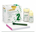 GC Gold Label 2 Big Pack powder and liquid bottles with measuring spoon and mixing pad – self-cure glass ionomer restorative for anterior and posterior dental restorations in clinics
